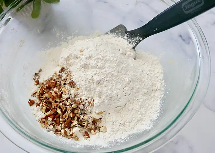Jogue Bourbon Pecan Shortbread cookie ingredients in a glass bowl.